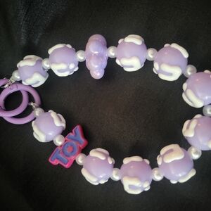 HANDMADE PURPLE AND WHITE BEADED PHONE/BAG/KEYCHAIN
